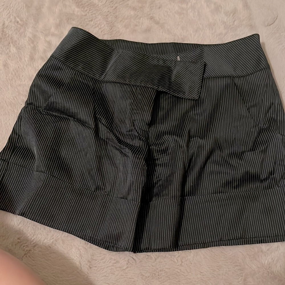 Bebe cuffed short. Higher waisted . Black small white pin stripe